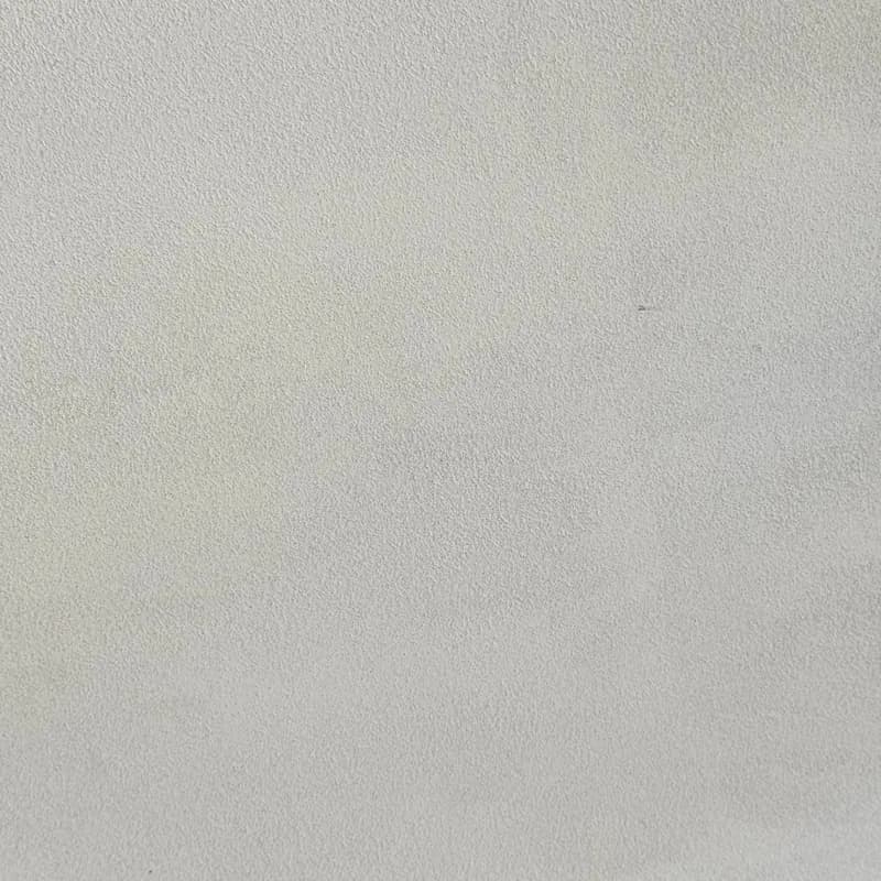 Een woonkamer met een lavavloer gietvloer.